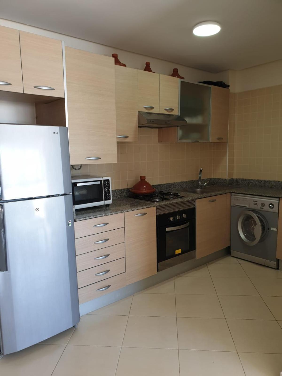 Assilah Marina Golf chez Ahmed Apartment Bagian luar foto
